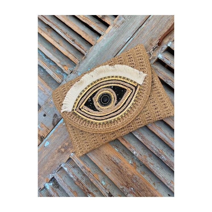 Sac à main raphia beige avec oeil noir et doré et perles